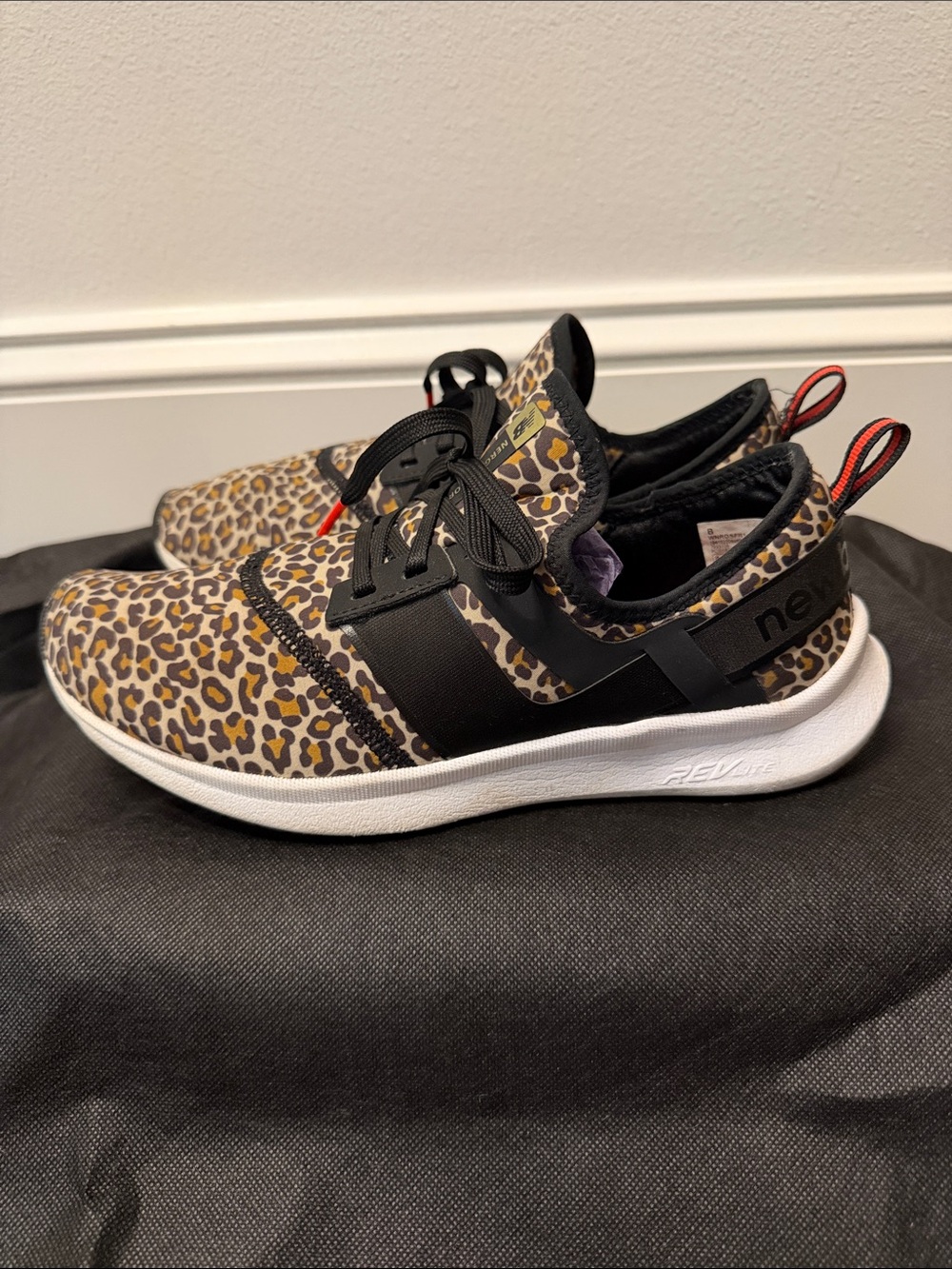 New Balance Kids Leopard-Print Sneakers with Black Straps and White Sole